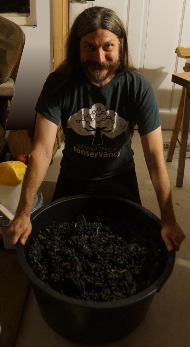 Eric with grape harvest