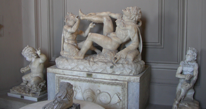 Vatican, marble statue tickling satyr